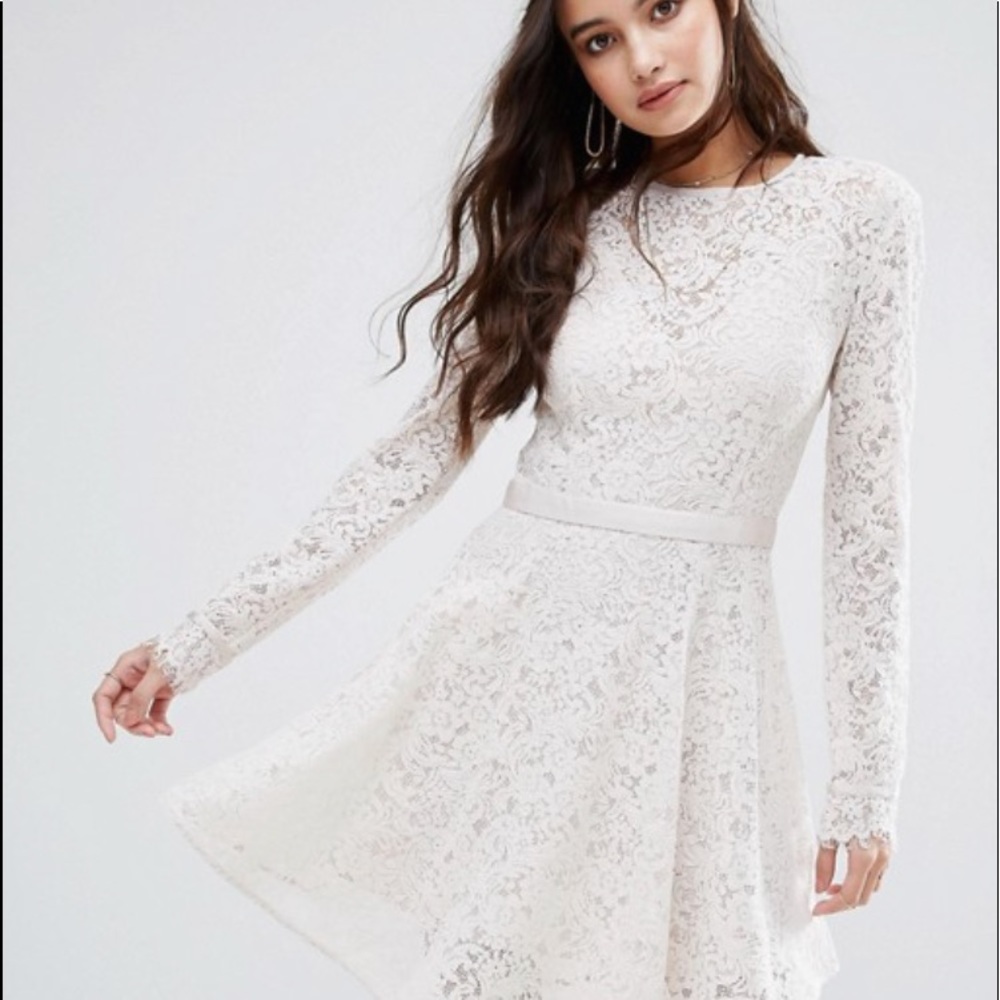 Long sleeve open back white lace dress